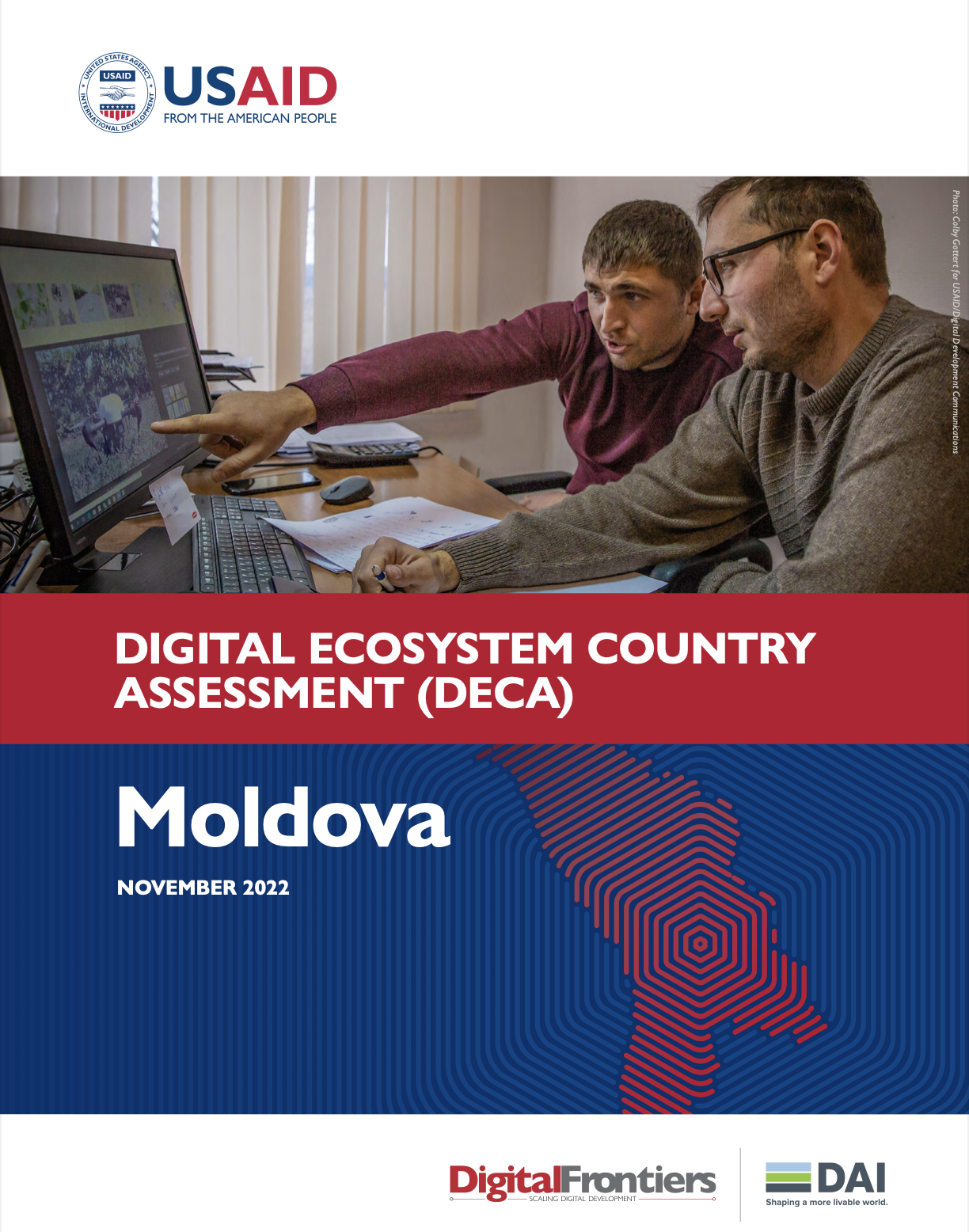 Two men looking intently at a computer screen on the cover of Moldova's Digital Ecosystem Country Assessment (DECA).