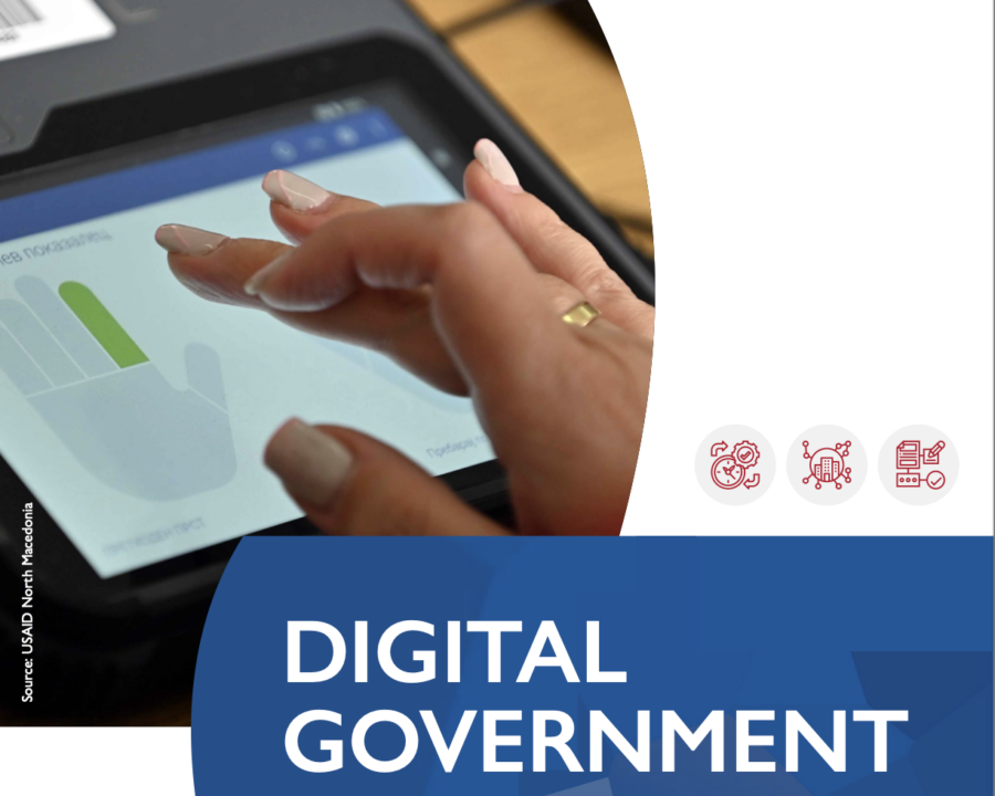 A smart phone on the cover of the Digital Government Model report.