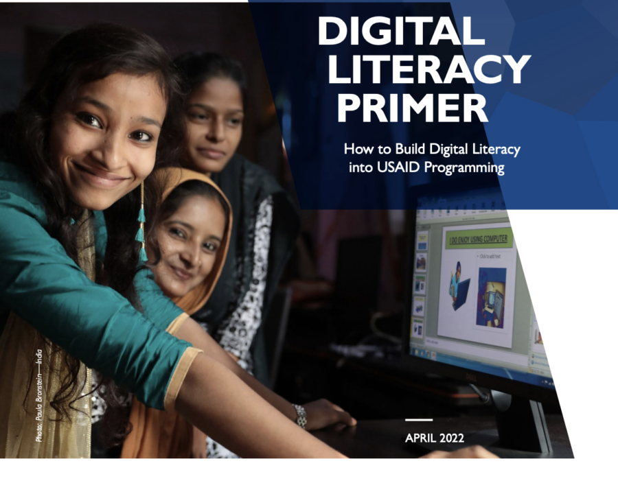 Three women smiling on the cover of the Digital Literacy Primer.