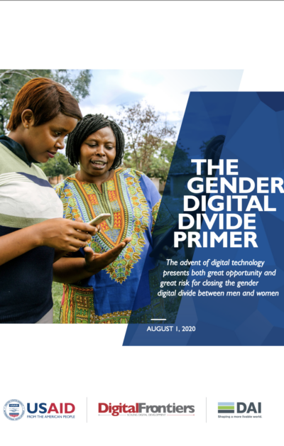 Two women looking at their smart phones and smiling on the cover of USAID's Gender Digital Divide Primer.